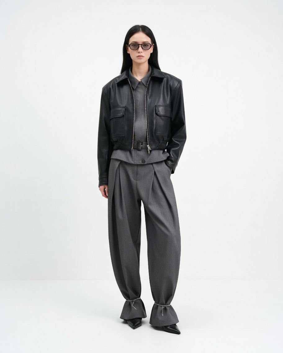 Women's black faux leather cropped jacket with zipper and pockets